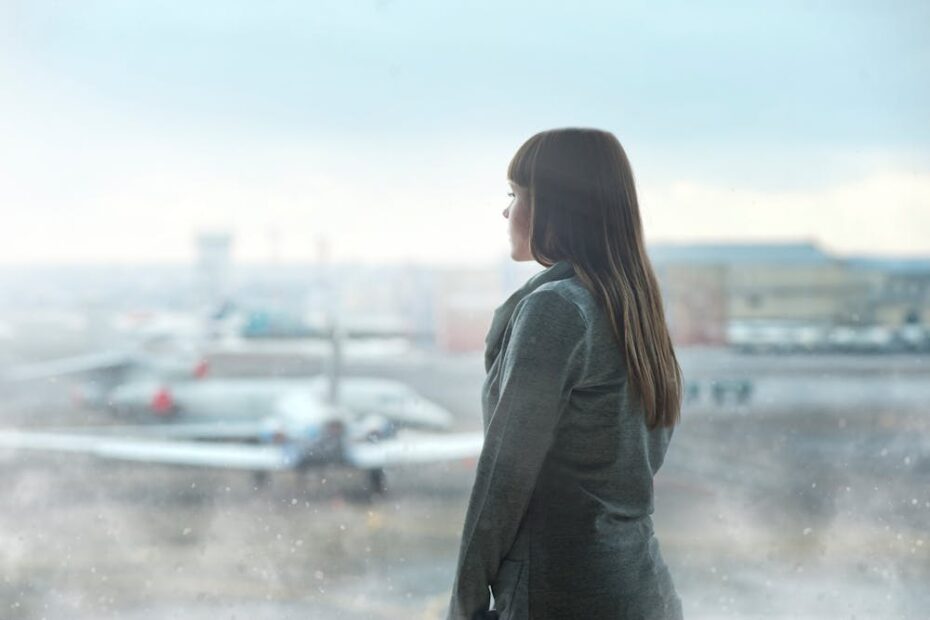 Woman waiting for a flight at the airport