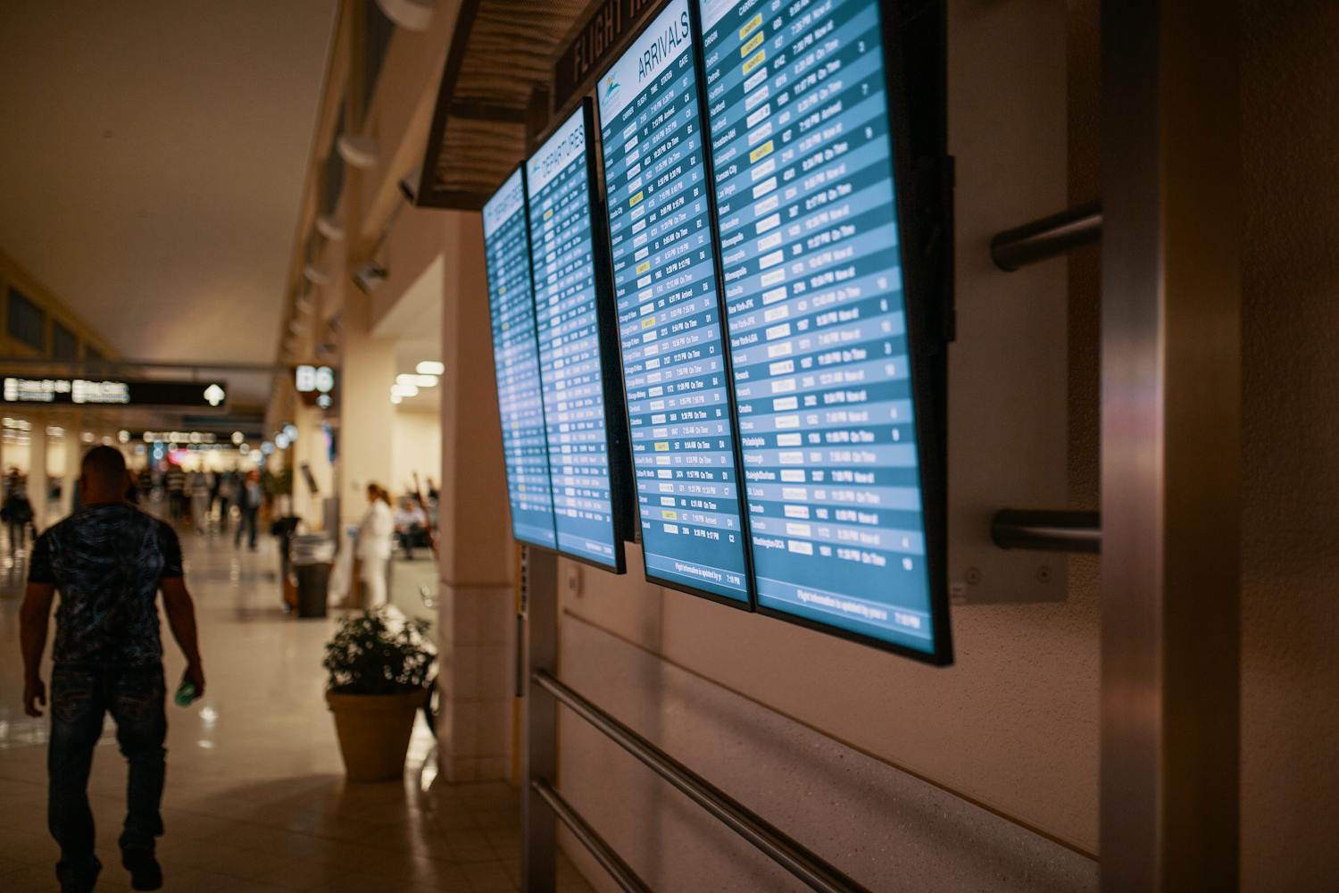 Flight information screens at an airport
